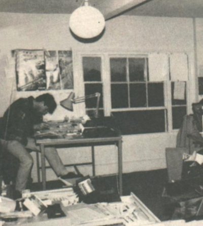 A general shot of one of the layout rooms in 'art'. See how hard at work they all are - and it's barely dawn outside. Very arty too - you can tell by the Habitat balloons on the lights.